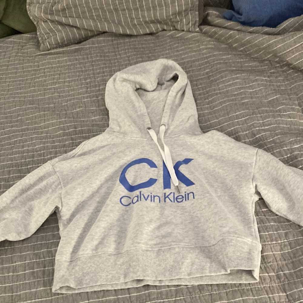 This is a white calvin klein sweatshirt